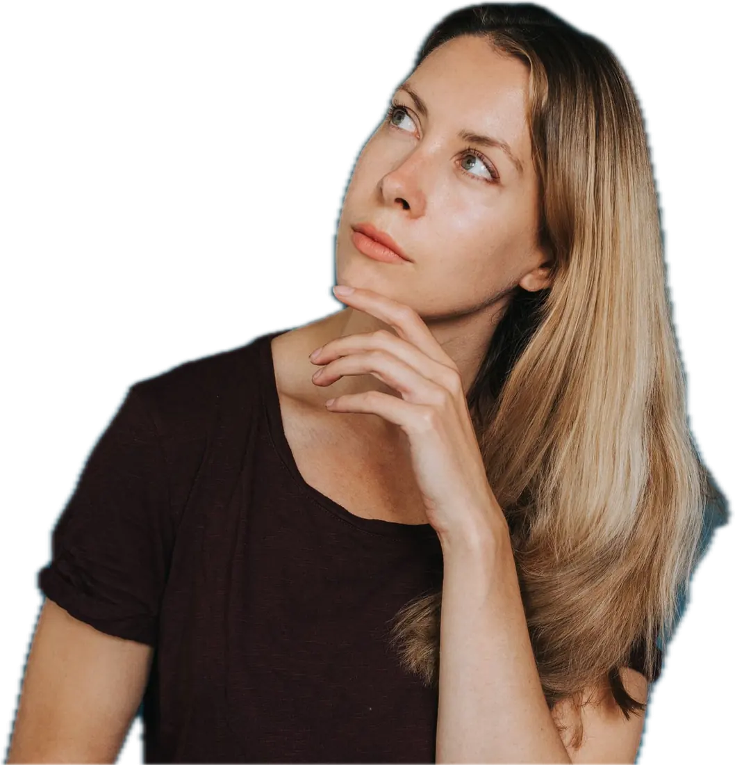 A woman with long hair thinking, hand on her chin, looking up